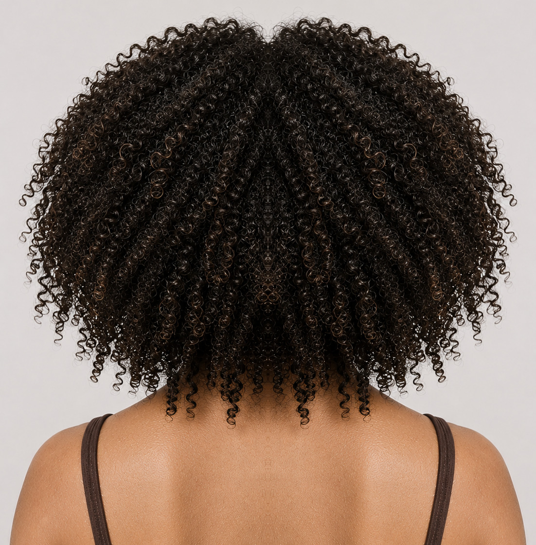 The same hair after the full routine, defined and clumped